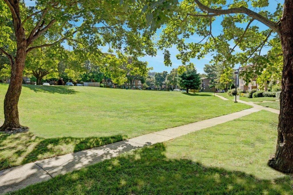 Walking path with large green spaces