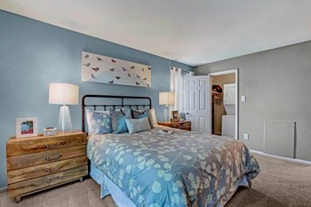 Model bedroom with laundry
