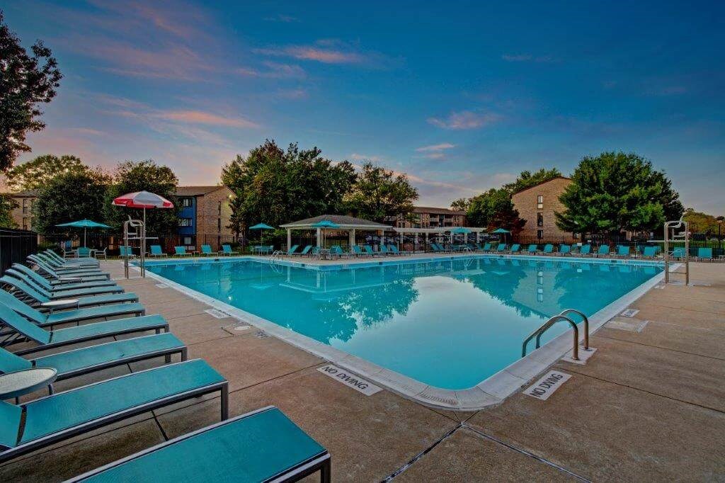 Community pool with loungers