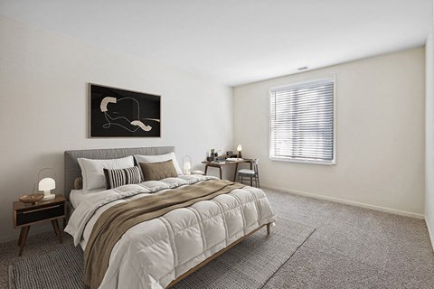 Apartments for Rent in Silver Spring, MD - Spring Parc - Bright Bedroom With Upholstered Bed, Neutral Bedding, Side Tables, Desk Nook, And Wide Window With Blinds Over Plush Carpet
