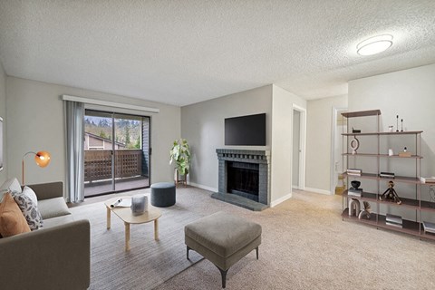 a living room with a fireplace and a television