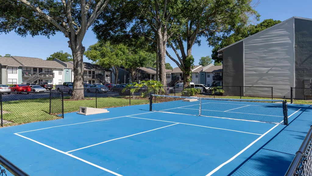 Tennis and cornhole courts