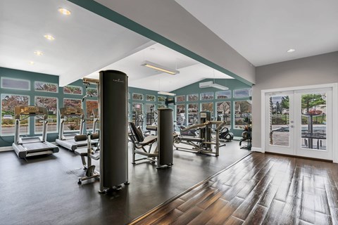 Community Fitness Center with Equipment at Misty Ridge Apartments located in Woodbridge, VA.