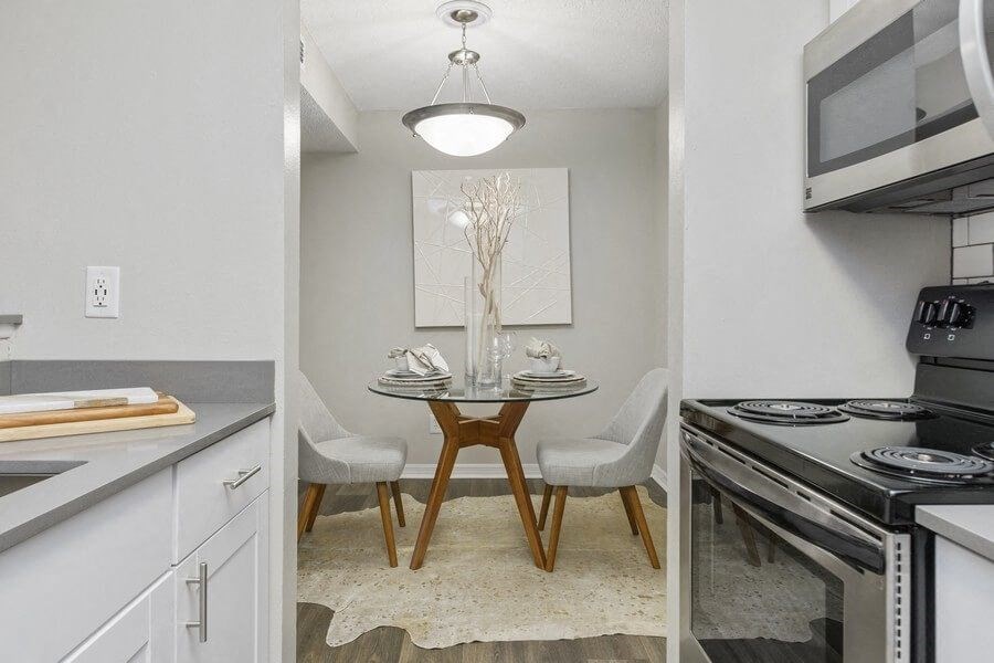Model kitchen with view of dining area