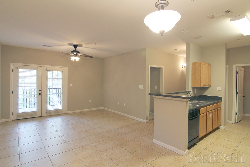 Living Room With Plenty Of Natural Lights at Arbours at Shoemaker Place, Defuniak Springs, FL, 32433