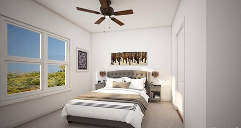 a bedroom with a bed and a ceiling fan