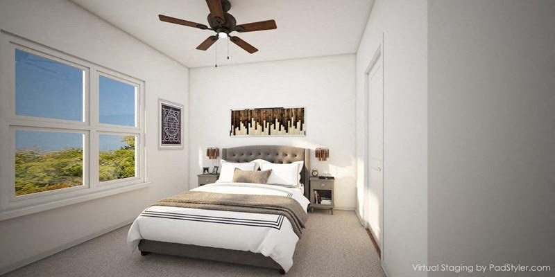 a bedroom with a bed and a ceiling fan