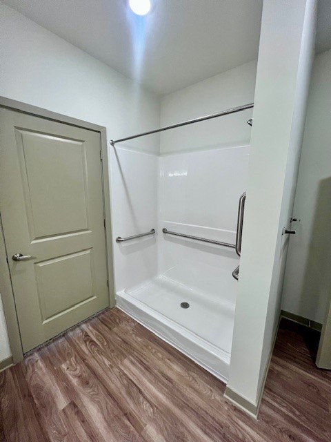 A white shower stall in a bathroom at Arbours at Moores Mill, Huntsville Alabama