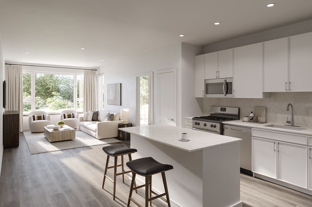 a kitchen and living room in a house