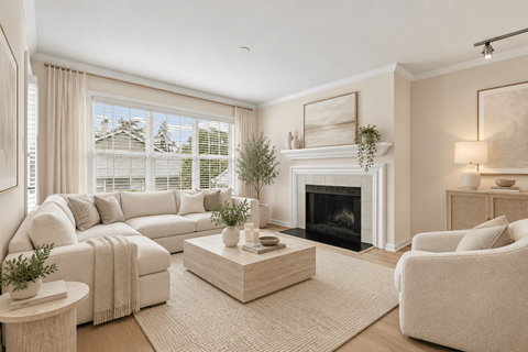 A living room with a fireplace and a couch.