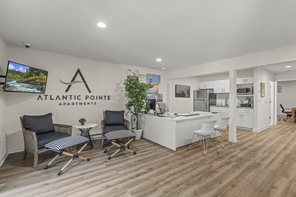 Apartments with a kitchen and living room area at Atlantic Pointe Apartments, Atlantic Highlands, 07716