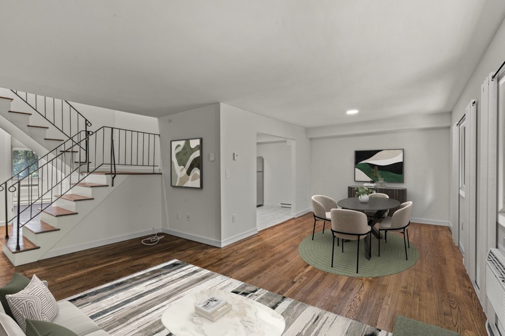 Living area along with staircase at Atlantic Pointe Apartments, Atlantic Highlands New Jersey