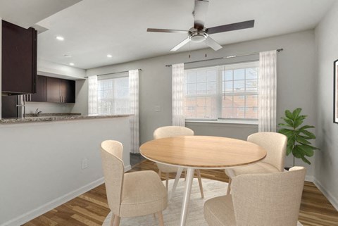 A dining room A dining room with a round table and chairs. at Chatham Hill, New Jersey, 07928