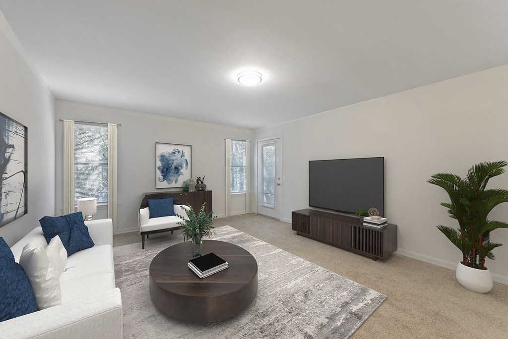 a living room with a couch and a tv