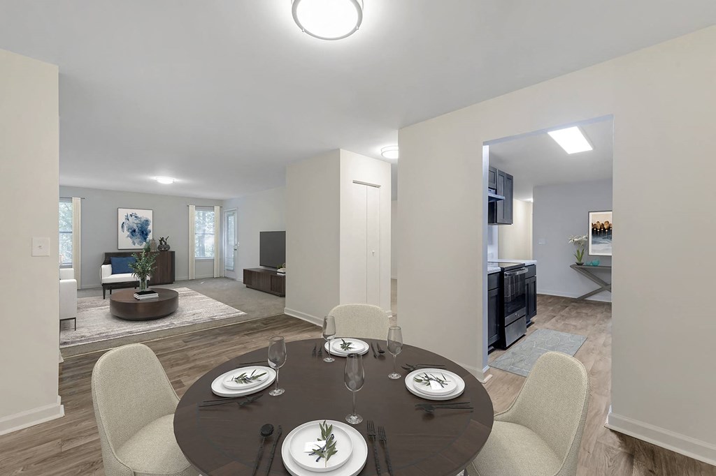 a dining room with a table and chairs