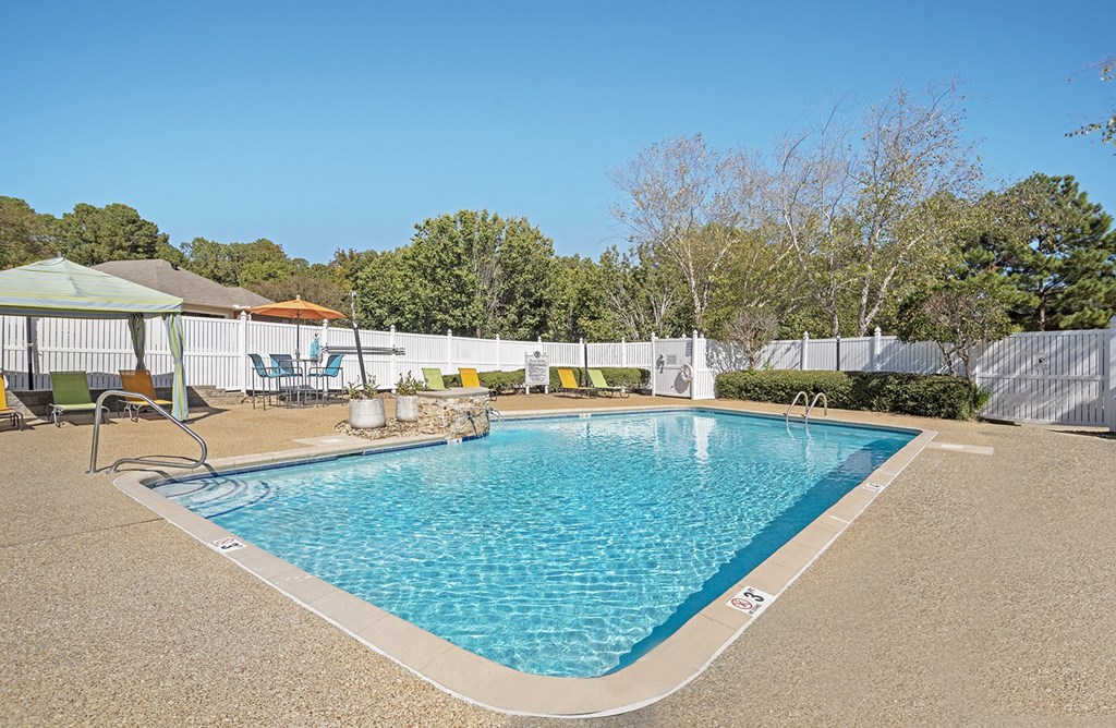 Swimming Pool with sitting area Swimming Pool with sitting area at Arbors at Natchez Trace Apartments, Ridgeland, MS