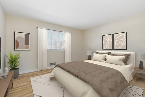 A bedroom with a large bed A bedroom with a large bed and two framed pictures on the wall. at Chatham Hill, New Jersey, 07928
