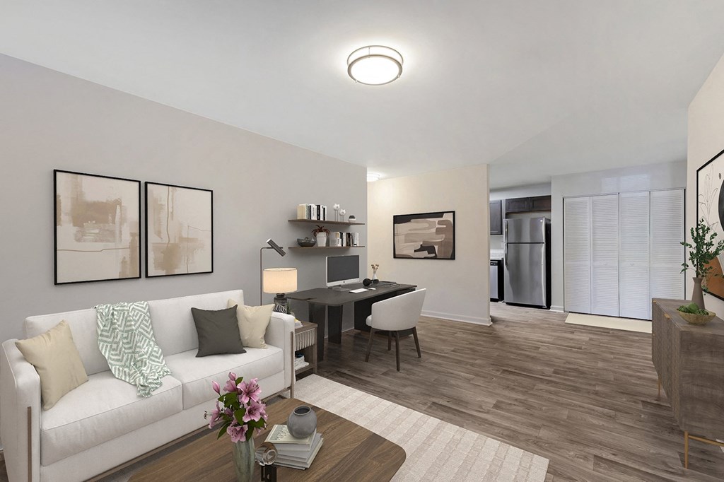 a living room and dining room with a couch and a table