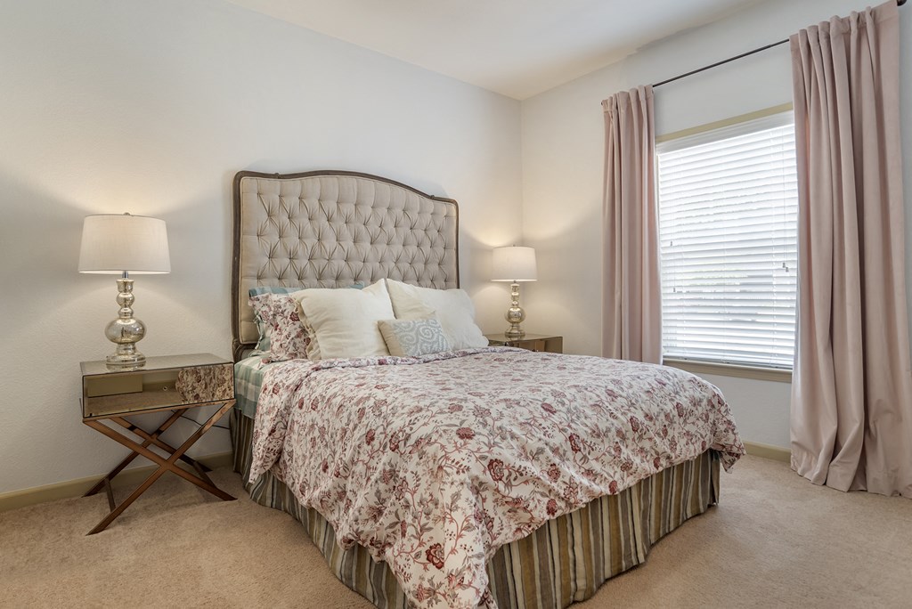 Bedroom with large window at Broadstreet at EastChase Apartments, Alabama