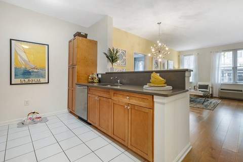 a kitchen with wooden cabinets and a counter top