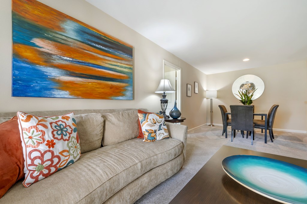 a bedroom with a bed and two windows