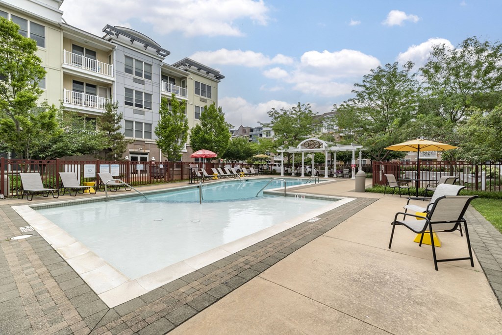 pool and patio with apartment buildings at Pier Village Apartments, Long Branch, NJ, 07740