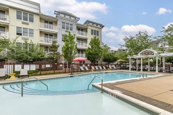 the preserve at ballantyne commons pool and spa with apartment buildings