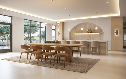 A modern dining room with a large table and chairs.