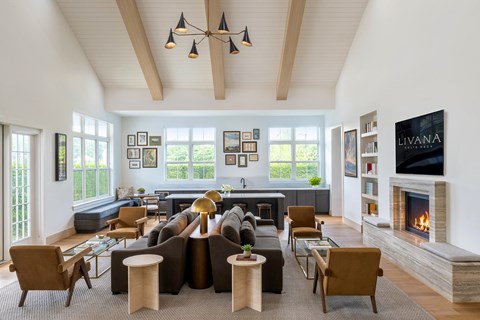 A living room with a fireplace and a couch.