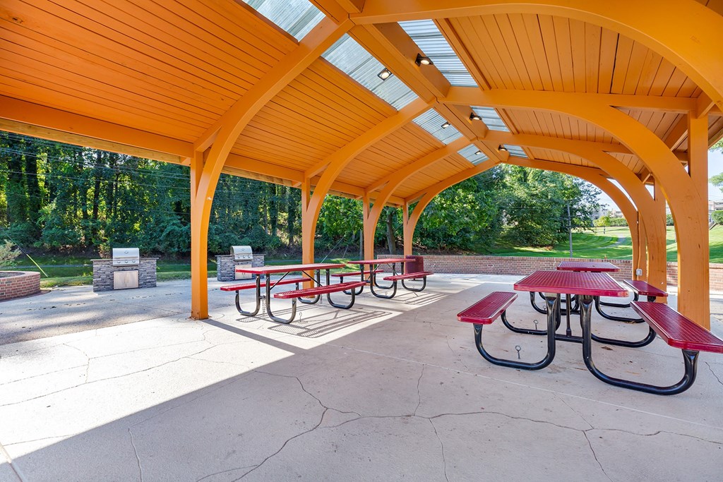 a covered picnic area with benches and tables at Copper and Quarry Village, Maryland, 21209