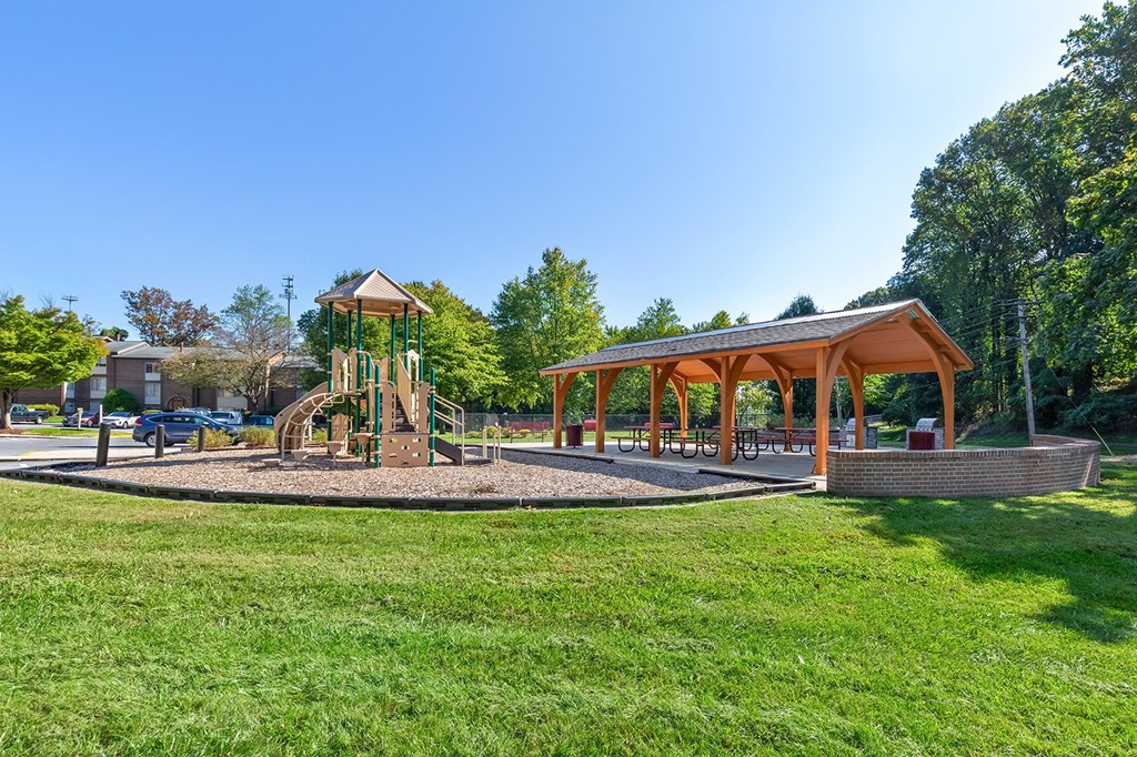 a park with a playground and a pavilion at Copper and Quarry Village, Pikesville, 21209