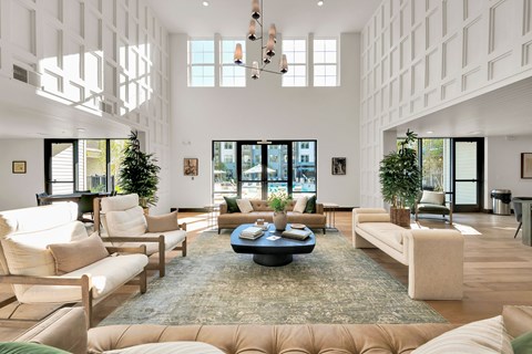 A living room with a large rug and a coffee table in the center.