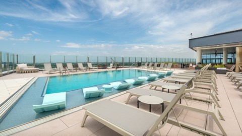 Swimming Pool with Sun Loungers at Eastline Residences Apartments, Dallas, TX, 75206