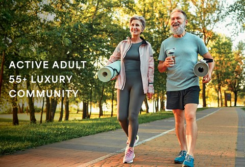 a man and a woman walking down a path with weights