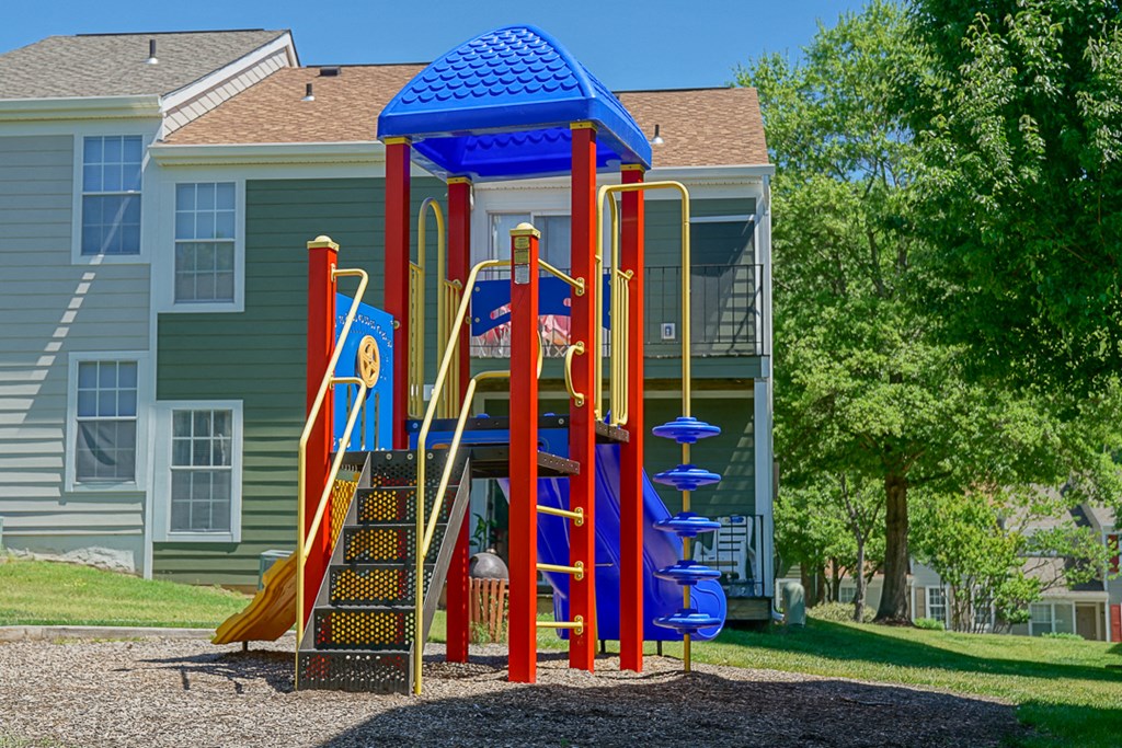 a playground in front of a house