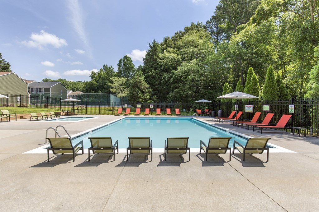 the swimming pool at woodland park apartments