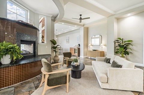 A living room with a fireplace and a couch.