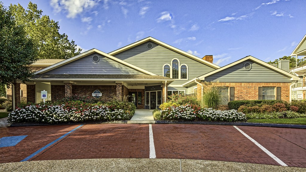 a large house with a driveway in front of it