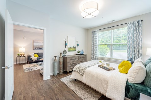 Bedroom with cozy bed at Lumen Apartments, Virginia