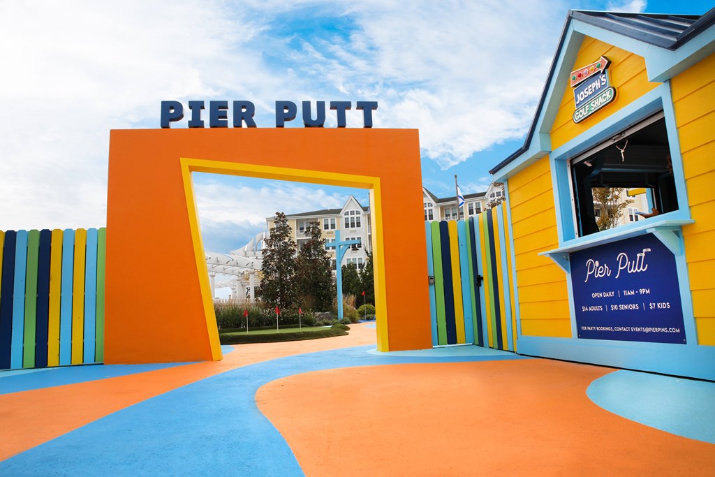 A brightly colored entrance to a place called Pier Putt.