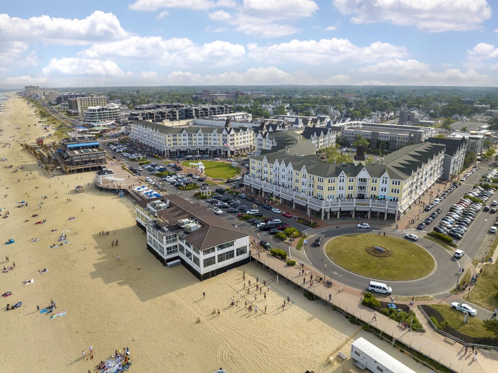 an aerial view of the beach and the city of cape cod