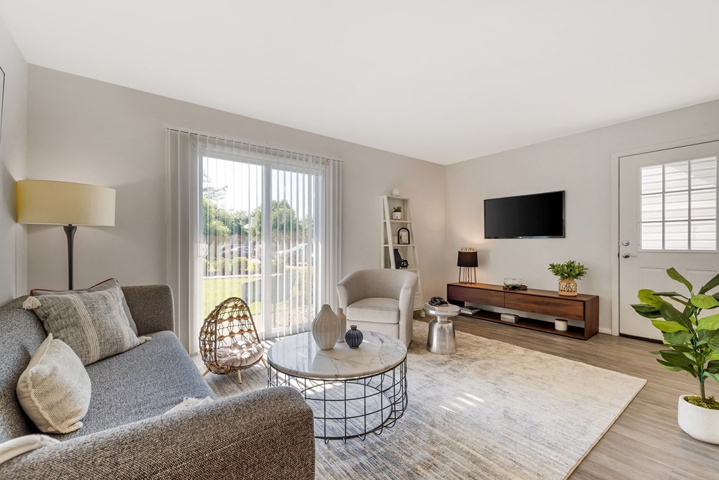 a living room with a couch and a chair and a tv at Quail Ridge, New Jersey, 08536
