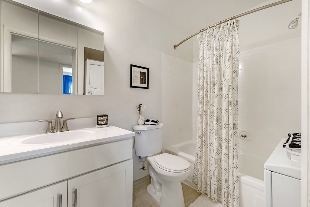 a bathroom with a sink toilet and a shower at Quail Ridge, Plainsboro Township, New Jersey