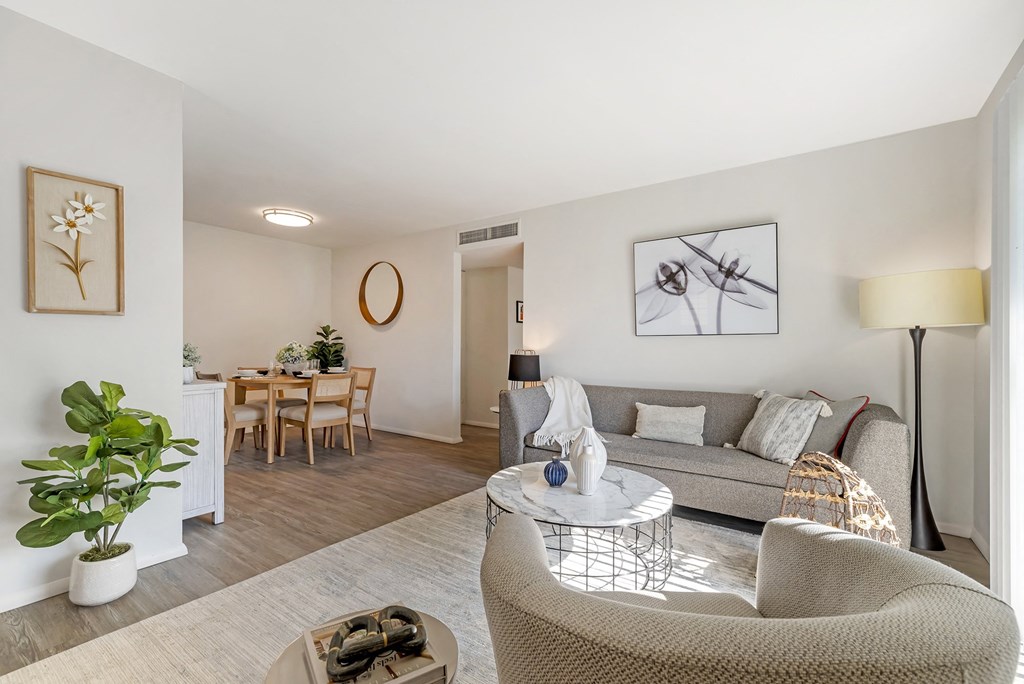 a living room with a couch and a table at Quail Ridge, Plainsboro Township, New Jersey
