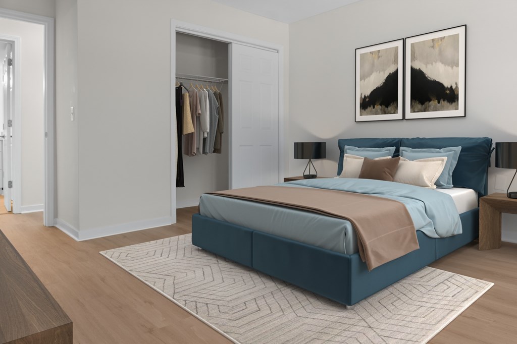 A bedroom with a large bed and a wardrobe. A bedroom with a large bed and a wardrobe. at Reflection Pointe, Flowood, MS, 39232
