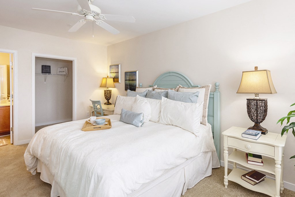 Bed and lamps at River House Apartments, Norfolk, VA