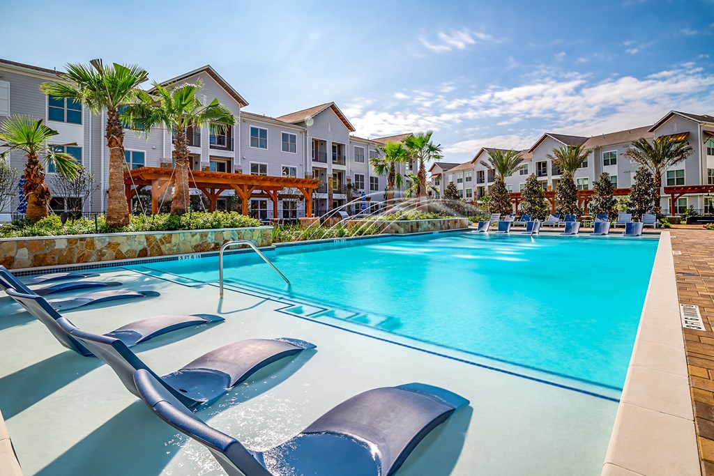 Pool with Deck Pool with Deck at Stone Loch Apartments, Tomball, TX 77375