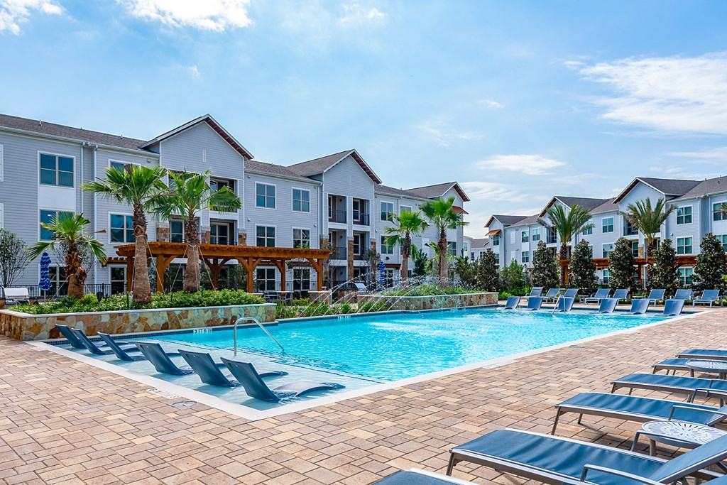 Pool Seating at Stone Loch Apartments, TX 77375