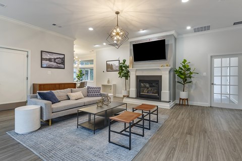Clubhouse With Expansive Windows and fireplace at The Apartments at The Sycamores, Reston, VA, 20190