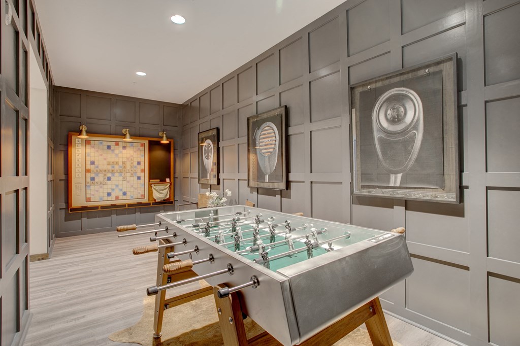 Game room with a foosball table at The Cosmopolitan, Tulsa, OK